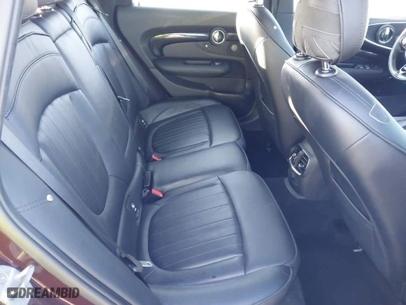 2016 MINI Cooper Clubman with VIN WMWLN5C50G2E29740, listed as a IAAI auction lot 41345976 with 67,124 mi miles. Bid and sale history available at carsss.com. Image 8.