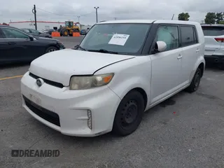 2014 Scion xB with VIN JTLZE4FEXEJ054060, listed as a IAAI auction lot 42096159 with 211,994 mi miles. Bid and sale history available at carsss.com. Image 17.