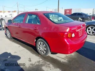 2009 Toyota Corolla with VIN JTDBL40E199074474, listed as a IAAI auction lot 41869413 with 264,873 mi miles. Bid and sale history available at carsss.com. Image 3.