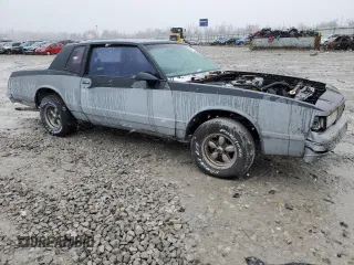 1987 Chevrolet Monte Carlo z VIN 1G1GZ11Z9HR104445, wystawiony jako Copart lot #48035825 z przebiegiem 68 929 mil mil oraz Tytuł czysty. Historia ofert i sprzedaży dostępna na DreamBid. Obrazek 4.