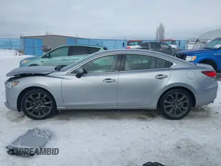 2014 Mazda Mazda6 i Touring with VIN JM1GJ1V62E1134427, listed as a IAAI auction lot 41550411 with 112,804 mi miles. Bid and sale history available at carsss.com. Image 14.
