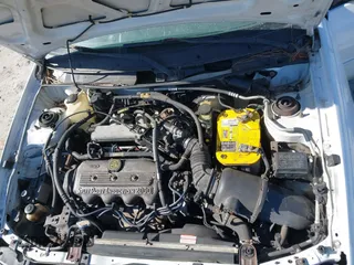 1999 Ford Escort SE with VIN 3FAFP15P4XR162456, listed as a IAAI auction lot 41245885 with 159,128 mi miles. Bid and sale history available at carsss.com. Image 10.