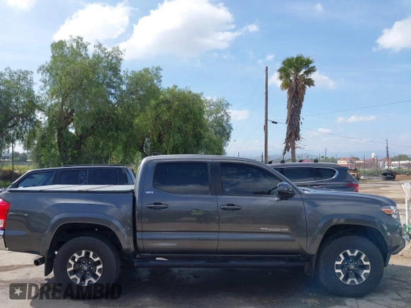 2017 Toyota Tacoma SR5 with VIN 3TMAZ5CN6HM050456, listed as a IAAI auction lot 38968606 with 48,576 mi miles and . Bid and sale history available at DreamBid. Image 14.