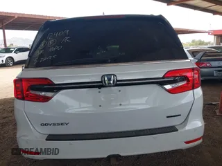 2021 Honda Odyssey Touring z VIN 5FNRL6H85MB034888, wystawiony jako IAAI lot #42386984 z przebiegiem 40 514 mil mil oraz . Historia ofert i sprzedaży dostępna na DreamBid. Obrazek 16.