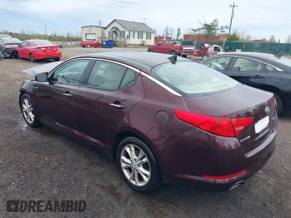 2013 Kia Optima EX with VIN 5XXGN4A73DG147517, listed as a IAAI auction lot 41959679 with 133,810 mi miles and . Bid and sale history available at DreamBid. Image 3.