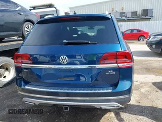 2018 Volkswagen Atlas SEL z VIN 1V2MR2CA4JC512804, wystawiony jako IAAI lot #42528402 z przebiegiem 59 226 mil mil oraz . Historia ofert i sprzedaży dostępna na DreamBid. Obrazek 16.
