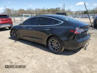 2020 Tesla Model 3 Long Range with VIN 5YJ3E1EB9LF639028, listed as a Copart auction lot 51652085 with 78,303 mi miles and Salvage Title. Bid and sale history available at carsss.com. Image 2.