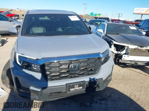 2022 Honda Passport EX-L with VIN 5FNYF7H57NB005716, listed as a IAAI auction lot 41078499 with 33,141 mi miles and . Bid and sale history available at DreamBid. Image 12.