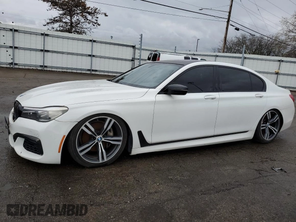 2017 BMW 7 Series 740i with VIN WBA7E2C3XHG741242, listed as a Copart auction lot 51577125 with 101,429 mi miles and Clean Title. Bid and sale history available at carsss.com. Image 1.