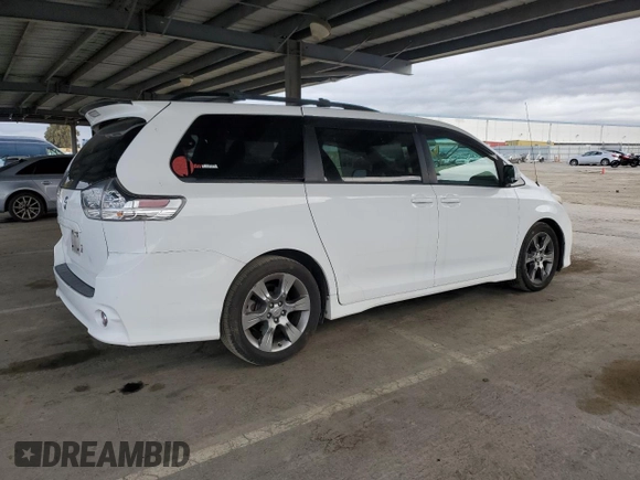 2012 Toyota Sienna SE with VIN 5TDXK3DC9CS215991, listed as a Copart auction lot 51868005 with 215,075 mi miles and Salvage title. Bid and sale history available at DreamBid. Image 3.