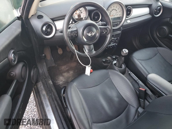 2011 MINI Hardtop with VIN WMWSU3C57BTX97173, listed as a Copart auction lot 50369155 with 122,713 mi miles and Salvage Title. Bid and sale history available at DreamBid. Image 8.
