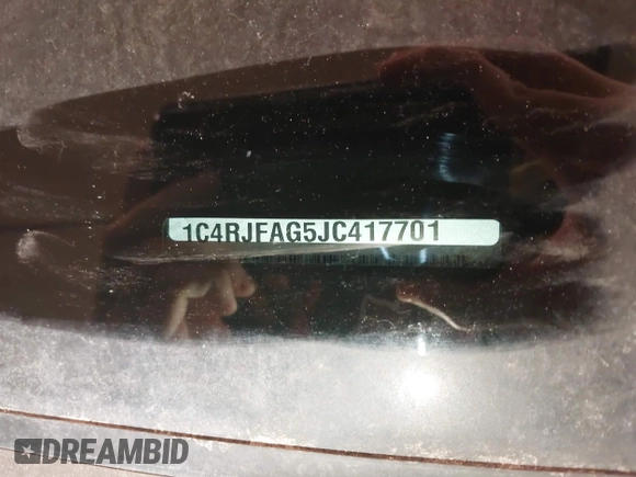 2018 Jeep Grand Cherokee Laredo E with VIN 1C4RJFAG5JC417701, listed as a IAAI auction lot 42001159 with 110,767 mi miles and . Bid and sale history available at DreamBid. Image 9.