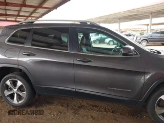 2021 Jeep Cherokee Limited with VIN 1C4PJLDX2MD187065, listed as a IAAI auction lot 41729812 with 71,470 mi miles and . Bid and sale history available at DreamBid. Image 13.