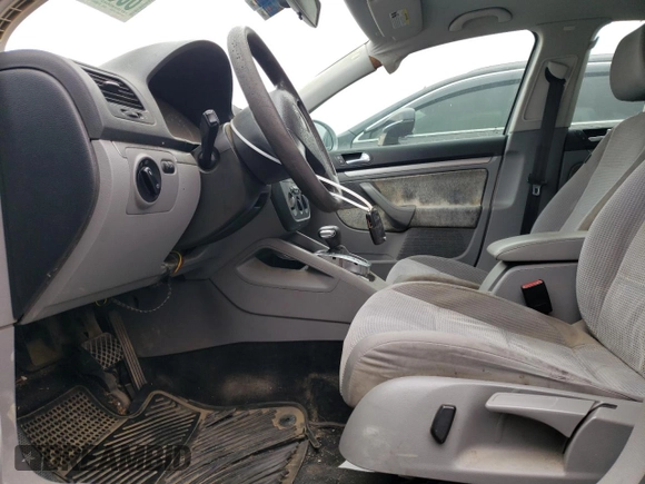2009 Volkswagen Jetta S z VIN 3VWJM71K79M167562, wystawiony jako Copart lot #80546594 z przebiegiem 196 891 mil mil oraz Szkoda całkowita • Salvage title. Historia ofert i sprzedaży dostępna na DreamBid. Obrazek 7.