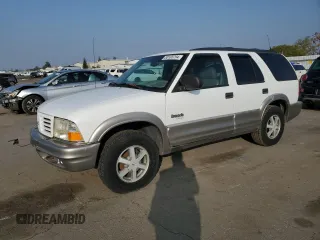 2000 Oldsmobile Bravada z VIN 1GHDT13W9Y2384823, wystawiony jako Copart lot #83105794 z przebiegiem Nie podano mil oraz Tytuł czysty. Historia ofert i sprzedaży dostępna na DreamBid. Obrazek 1.