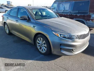 2018 Kia Optima LX with VIN 5XXGT4L32JG256921, listed as a IAAI auction lot 41389850 with 91,013 mi miles and . Bid and sale history available at DreamBid. Image 1.