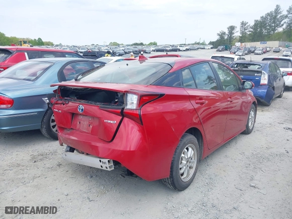 2021 Toyota Prius L Eco with VIN JTDKAMFU7M3147346, listed as a IAAI auction lot 41979206 with 55,267 mi miles. Bid and sale history available at carsss.com. Image 4.