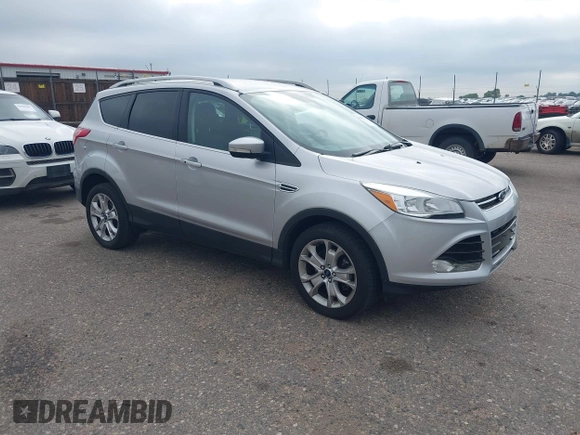 2016 Ford Escape Titanium with VIN 1FMCU9JX3GUC86930, listed as a IAAI auction lot 42582263 with 113,386 mi miles and . Bid and sale history available at DreamBid. Image 1.
