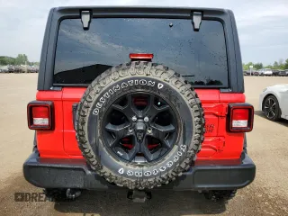 2022 Jeep Wrangler Unlimited Willys with VIN 1C4HJXDN7NW217581, listed as a Copart auction lot 64223115 with 51,132 mi miles and Clean title. Bid and sale history available at DreamBid. Image 6.