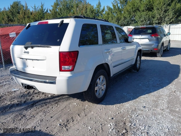 2009 Jeep Grand Cherokee Limited with VIN 1J8HR58P89C513900, listed as a IAAI auction lot 41615957 with 152,119 mi miles. Bid and sale history available at carsss.com. Image 4.