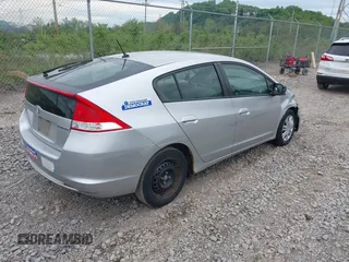 2010 Honda Insight LX with VIN JHMZE2H57AS008203, listed as a IAAI auction lot 42240869 with 150,562 mi miles and . Bid and sale history available at DreamBid. Image 4.