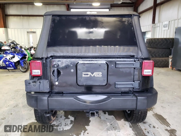 2013 Jeep Wrangler Rubicon with VIN 1C4BJWCG1DL584611, listed as a Copart auction lot 71536944 with 142,975 mi miles and Salvage title. Bid and sale history available at DreamBid. Image 6.