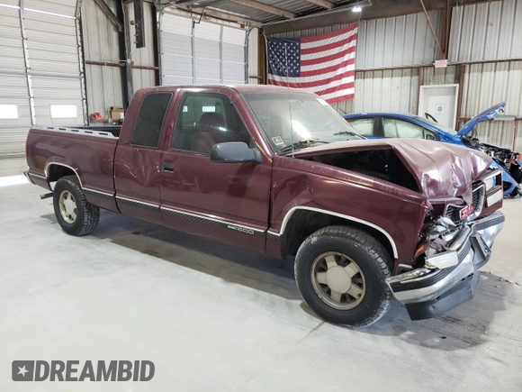 1996 GMC Sierra 1500 with VIN 2GTEC19W3T1560582, listed as a Copart auction lot 73985374 with 250,033 mi miles and Salvage Title. Bid and sale history available at DreamBid. Image 4.