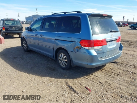 2010 Honda Odyssey EX-L with VIN 5FNRL3H7XAB052742, listed as a IAAI auction lot 41705935 with 205,190 mi miles and . Bid and sale history available at DreamBid. Image 3.