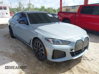 2025 BMW i4 xDrive40 z VIN WBY43HD02SFU51432, wystawiony jako IAAI lot #42170392 z przebiegiem 1 602 mil mil oraz . Historia ofert i sprzedaży dostępna na DreamBid. Obrazek 1.