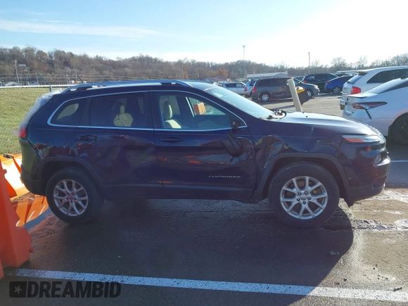 2015 Jeep Cherokee Latitude with VIN 1C4PJMCS0FW583658, listed as a IAAI auction lot 41106819 with 101,849 mi miles. Bid and sale history available at carsss.com. Image 13.