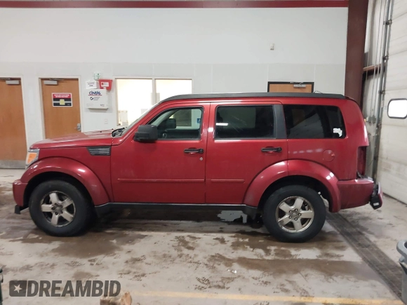 2008 Dodge Nitro SXT with VIN 1D8GU28K88W120319, listed as a IAAI auction lot 41683834 with 166,268 mi miles. Bid and sale history available at carsss.com. Image 15.