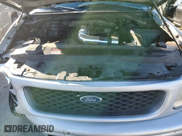 1998 Ford F-150 with VIN 2FTZF07W8WCA96137, listed as a Copart auction lot 82886074 with 181,690 mi miles and Salvage title. Bid and sale history available at DreamBid. Image 11.
