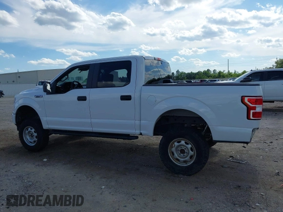 2019 Ford F-150 XL with VIN 1FTEW1EP7KFB10186, listed as a IAAI auction lot 42230640 with 105,234 mi miles and . Bid and sale history available at DreamBid. Image 14.