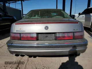1997 Cadillac Seville Luxury SLS z VIN 1G6KS52Y5VU815770, wystawiony jako Copart lot #88555205 z przebiegiem 92 459 mil mil oraz Czysty tytuł • Clean title. Historia ofert i sprzedaży dostępna na DreamBid. Obrazek 6.
