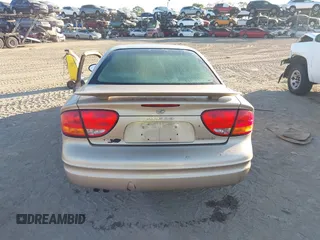 2004 Oldsmobile Alero GL1 z VIN 1G3NL52E34C191243, wystawiony jako IAAI lot #41536825 z przebiegiem 117 998 mil mil oraz . Historia ofert i sprzedaży dostępna na DreamBid. Obrazek 16.