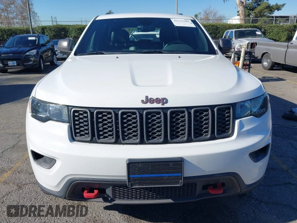 2017 Jeep Grand Cherokee Trailhawk with VIN 1C4RJFLGXHC959092, listed as a IAAI auction lot 41232281 with 108,659 mi miles and . Bid and sale history available at DreamBid. Image 12.