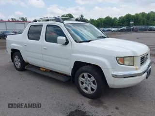 2006 Honda Ridgeline RTL with VIN 2HJYK16576H504714, listed as a IAAI auction lot 42563560 with 10,176 mi miles and . Bid and sale history available at DreamBid. Image 1.