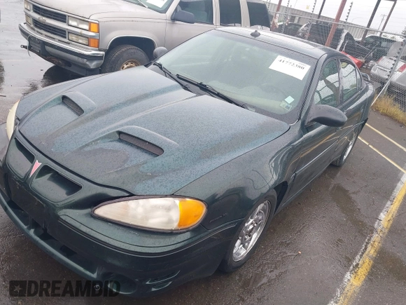 2003 Pontiac Grand Am GT1 with VIN 1G2NV52EX3C164442, listed as a IAAI auction lot 41772380 with 150,134 mi miles. Bid and sale history available at carsss.com. Image 2.