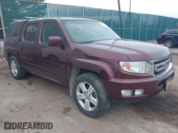 2011 Honda Ridgeline RTL with VIN 5FPYK1F51BB007959, listed as a IAAI auction lot 41894350 with 186,926 mi miles. Bid and sale history available at carsss.com. Image 1.