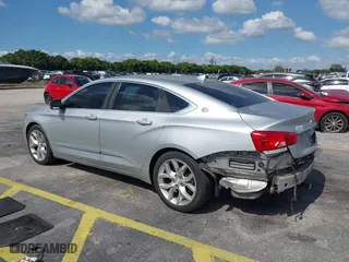 2014 Chevrolet Impala LTZ with VIN 2G1145SL2E9213986, listed as a IAAI auction lot 41526798 with 202,836 mi miles. Bid and sale history available at carsss.com. Image 3.