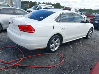 2013 Volkswagen Passat SE w/Sunroof & Nav with VIN 1VWBP7A36DC084901, listed as a IAAI auction lot 41937719 with 255,125 mi miles. Bid and sale history available at carsss.com. Image 4.