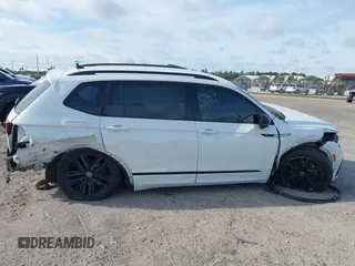 2022 Volkswagen Tiguan SE R-Line Black z VIN 3VVCB7AX5NM007401, wystawiony jako IAAI lot #41630458 z przebiegiem 55 635 mil mil oraz . Historia ofert i sprzedaży dostępna na DreamBid. Obrazek 6.