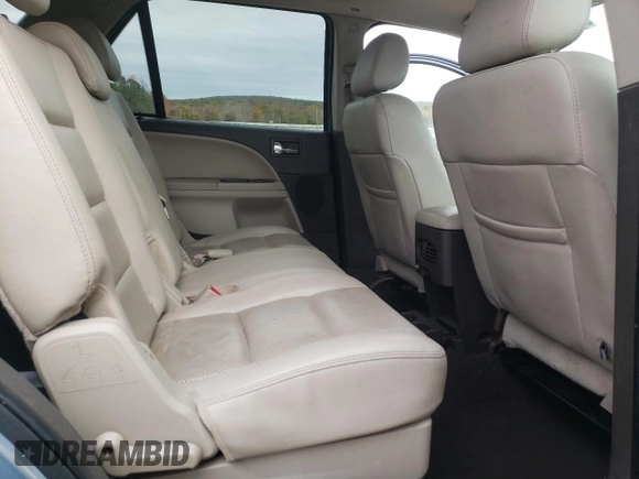 2009 Ford Taurus X Limited with VIN 1FMDK03W89GA01358, listed as a Copart auction lot 79132254 with 173,623 mi miles and Salvage title. Bid and sale history available at DreamBid. Image 11.
