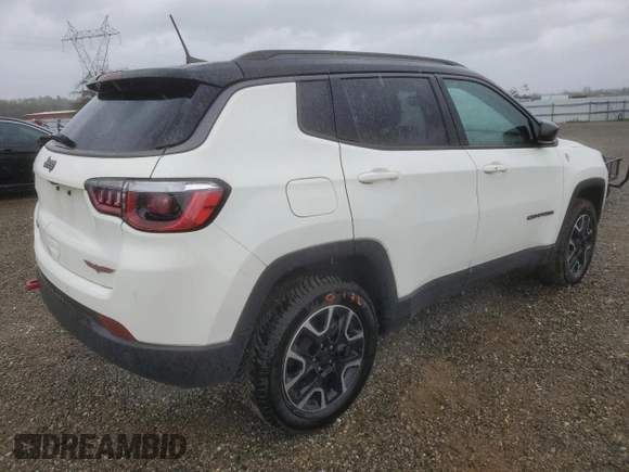 2019 Jeep Compass Trailhawk with VIN 3C4NJDDB4KT790351, listed as a Copart auction lot 48588285 with 67,417 mi miles and Salvage Title. Bid and sale history available at DreamBid. Image 3.