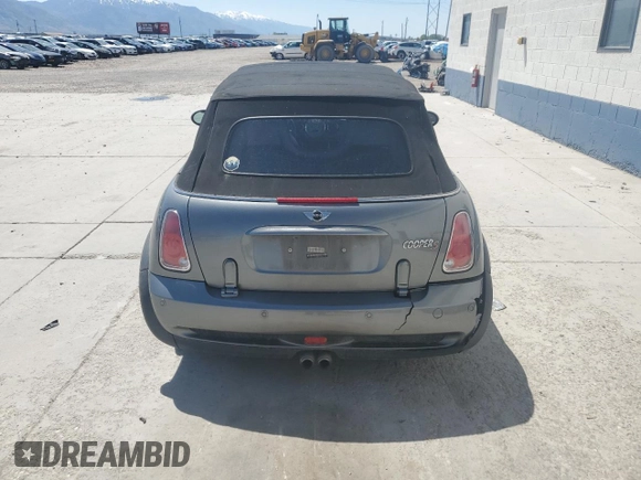 2006 MINI Convertible S with VIN WMWRH33526TL93755, listed as a Copart auction lot 57830835 with Not provided miles and Clean title. Bid and sale history available at DreamBid. Image 6.