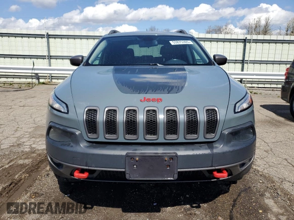2014 Jeep Cherokee Trailhawk with VIN 1C4PJMBB4EW203320, listed as a Copart auction lot 53875305 with 112,425 mi miles and Clean Title. Bid and sale history available at carsss.com. Image 5.