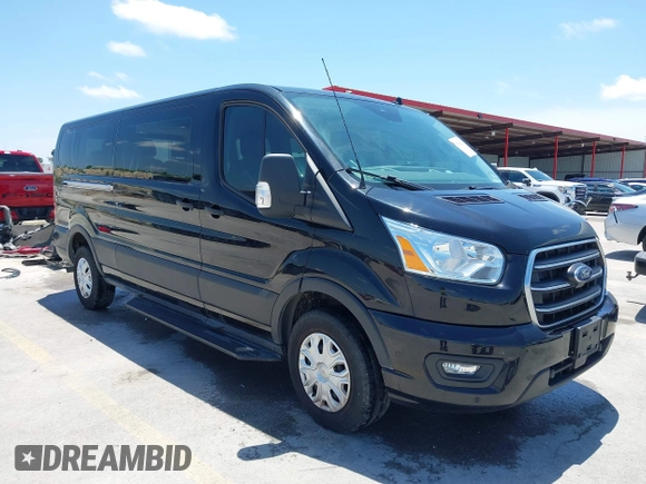 2020 Ford Transit Passenger XL z VIN 1FBAX2YG0LKA55428, wystawiony jako IAAI lot #42356622 z przebiegiem 89 748 mil mil oraz . Historia ofert i sprzedaży dostępna na DreamBid. Obrazek 1.
