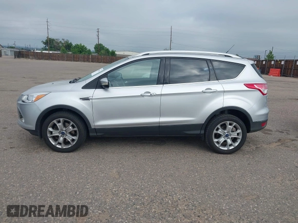 2016 Ford Escape Titanium with VIN 1FMCU9JX3GUC86930, listed as a IAAI auction lot 42582263 with 113,386 mi miles and . Bid and sale history available at DreamBid. Image 14.