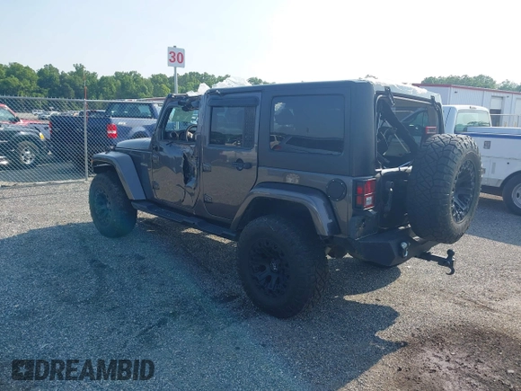 2016 Jeep Wrangler Unlimited Sport with VIN 1C4BJWDG9GL211030, listed as a IAAI auction lot 42459945 with 61,671 mi miles and . Bid and sale history available at DreamBid. Image 3.