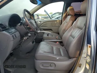 2009 Honda Odyssey EX-L with VIN 5FNRL38759B004710, listed as a Copart auction lot 54210425 with 171,674 mi miles and Salvage Title. Bid and sale history available at DreamBid. Image 7.